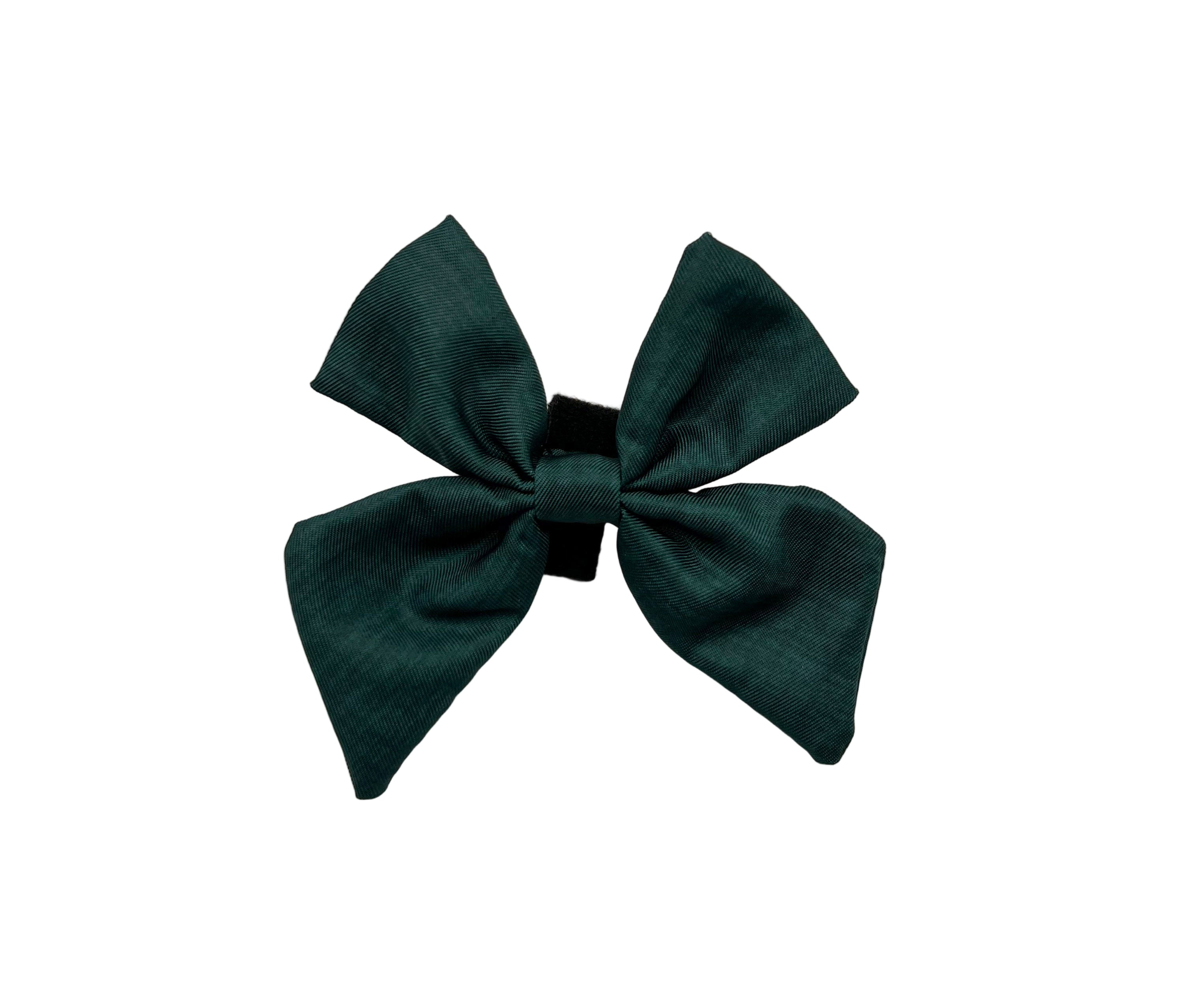 Dark green bow on a white background